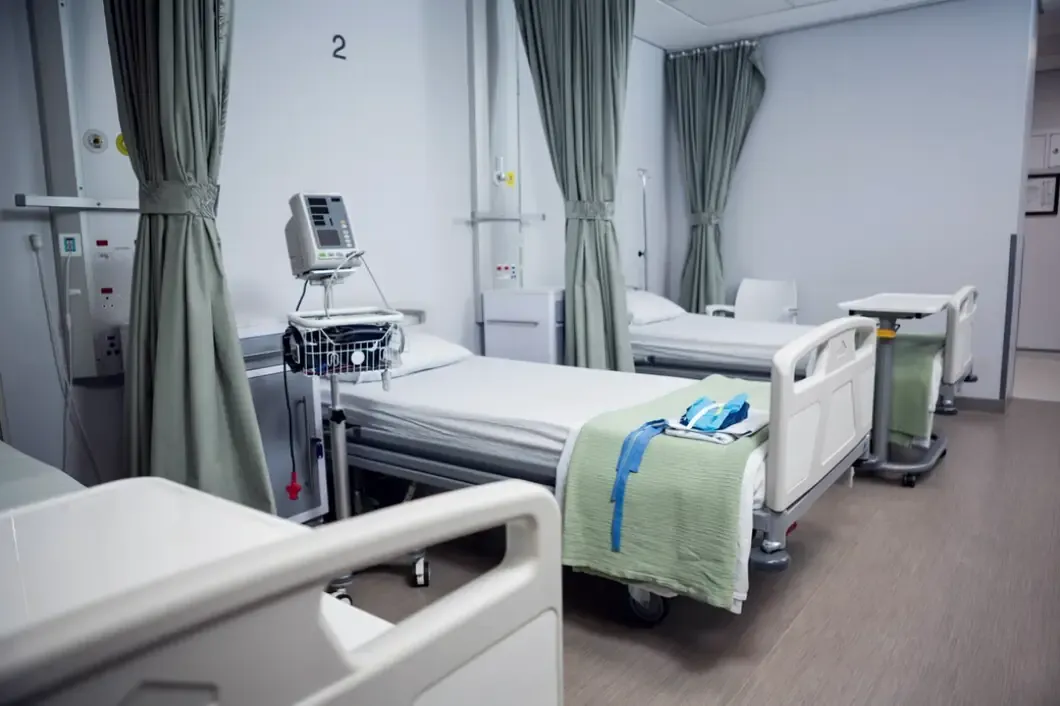 Hospital ward with patient beds and monitors, managed with Automedic healthcare software in Pakistan